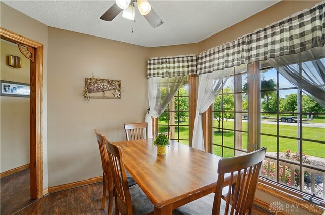 5193 Horseshoe Dr, Lewisburg, OH 45338 - dining space featuring baseboards, wood finished floors, and ceiling fan