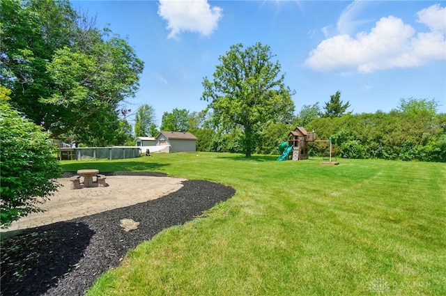 5193 Horseshoe Dr, Lewisburg, OH 45338 - view of grassy yard featuring a playground