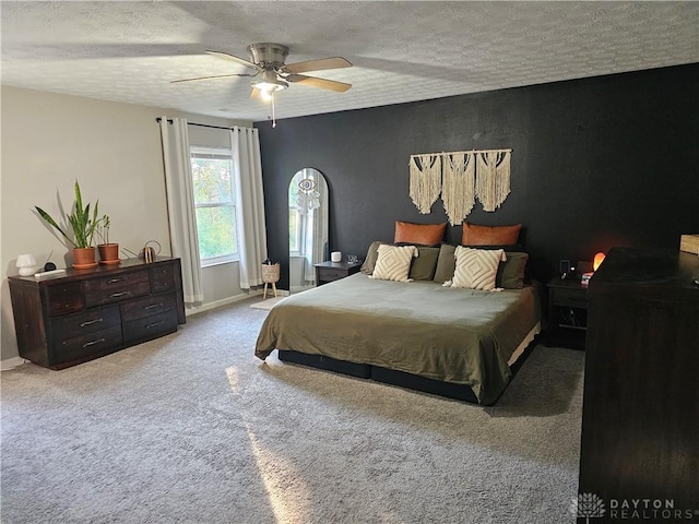1147 Spegele Ct, Xenia, OH 45385 - bedroom with carpet floors, a textured ceiling, baseboards, and ceiling fan