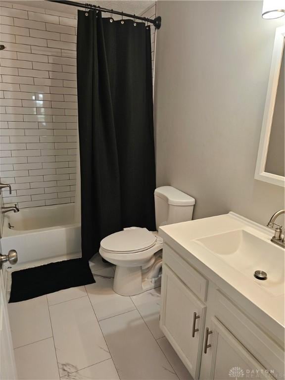 1147 Spegele Ct, Xenia, OH 45385 - bathroom featuring vanity, toilet, and shower / bath combo