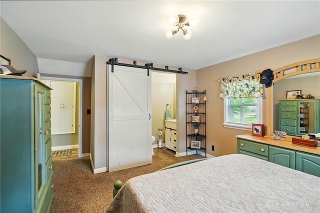 646 Barnhart Rd, Troy, OH 45373 - carpeted bedroom with baseboards, a barn door, and connected bathroom