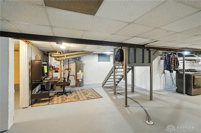 646 Barnhart Rd, Troy, OH 45373 - basement featuring washer / clothes dryer, gas water heater, stairs, and a drop ceiling