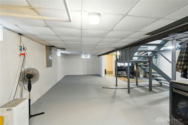 646 Barnhart Rd, Troy, OH 45373 - below grade area featuring stairs and a drop ceiling