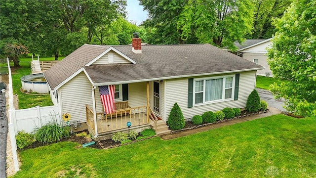 646 Barnhart Rd, Troy, OH 45373 - ranch-style house featuring covered porch, a chimney, and a shingled roof