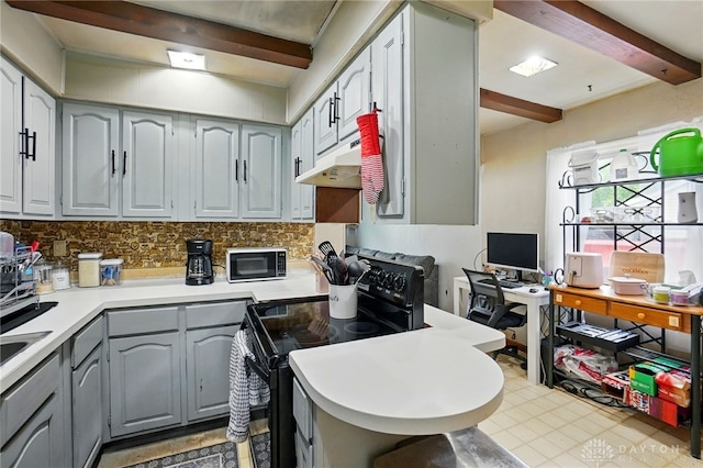 1432 Raybell Dr, Xenia, OH 45385 - kitchen with black appliances, gray cabinetry, beam ceiling, backsplash, and light countertops