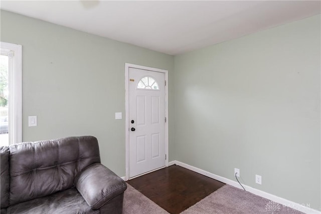 224 Locust Ln, West Milton, OH 45383 - entrance foyer with baseboards and dark colored carpet