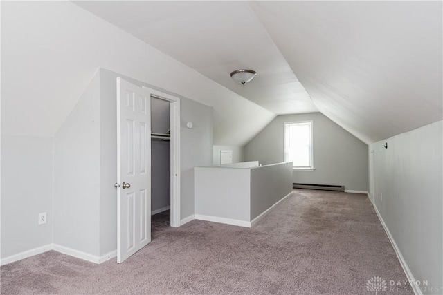 224 Locust Ln, West Milton, OH 45383 - bonus room with a baseboard heating unit, carpet flooring, lofted ceiling, and baseboards