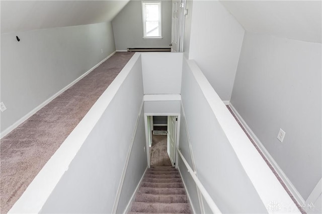 224 Locust Ln, West Milton, OH 45383 - staircase featuring carpet, a baseboard heating unit, and vaulted ceiling