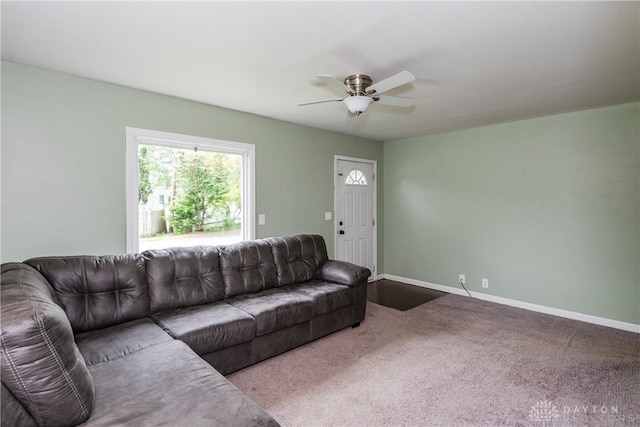 224 Locust Ln, West Milton, OH 45383 - carpeted living room featuring a ceiling fan and baseboards