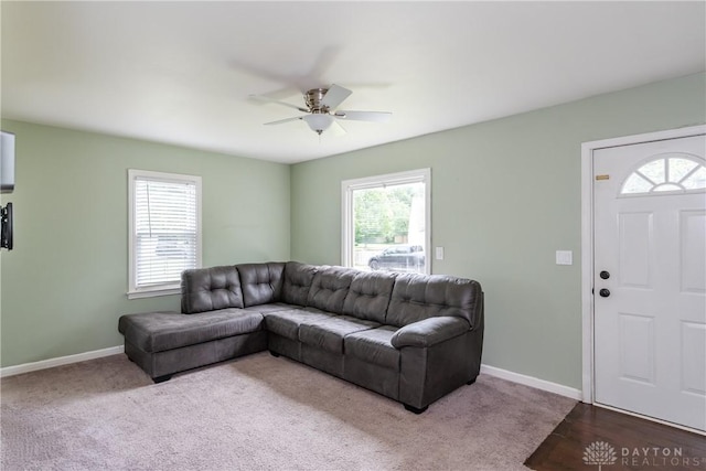 224 Locust Ln, West Milton, OH 45383 - living room featuring healthy amount of natural light, ceiling fan, carpet, and baseboards