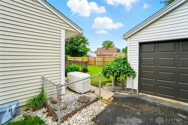 1725 Humphrey Ave, Dayton, OH 45410 - view of yard featuring a garage and driveway