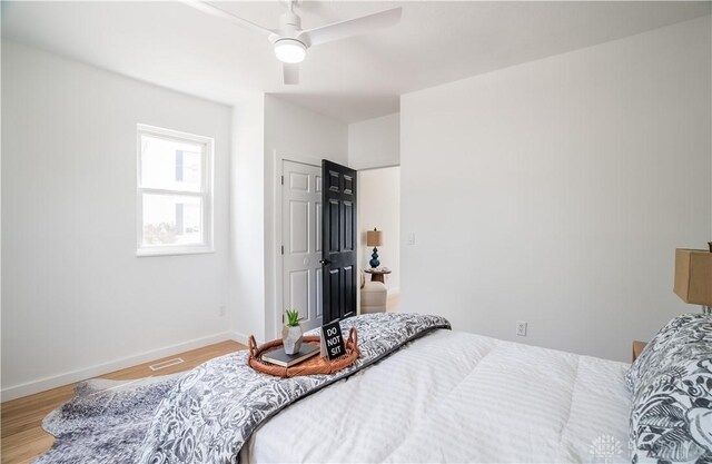 165 Mcreynolds St, Dayton, OH 45403 - bedroom with light wood-style floors and a ceiling fan