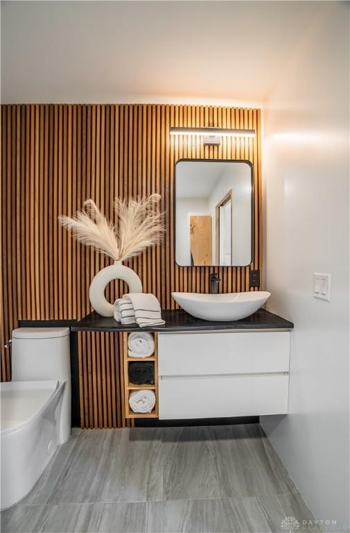 165 Mcreynolds St, Dayton, OH 45403 - half bathroom featuring vanity and toilet
