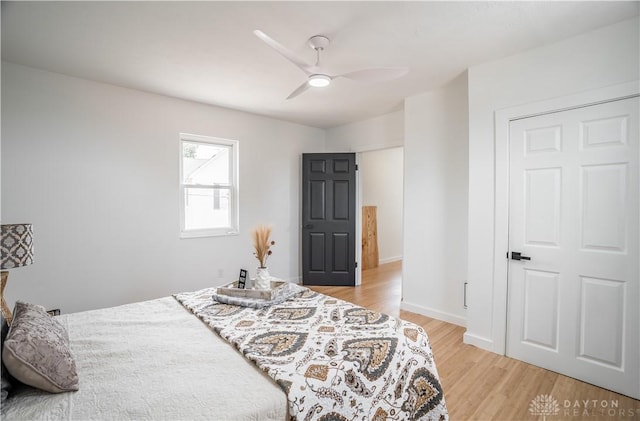 165 Mcreynolds St, Dayton, OH 45403 - bedroom with light wood-style floors and a ceiling fan