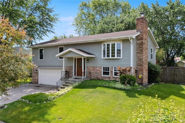 4278 Crownwood Ave, Dayton, OH 45415 - bi-level home with a chimney, concrete driveway, a garage, and brick siding