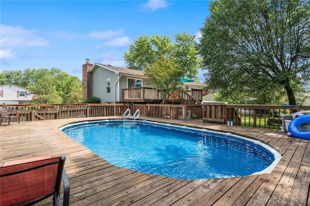 4278 Crownwood Ave, Dayton, OH 45415 - outdoor pool featuring a wooden deck