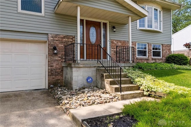 4278 Crownwood Ave, Dayton, OH 45415 - property entrance featuring brick siding and asphalt driveway