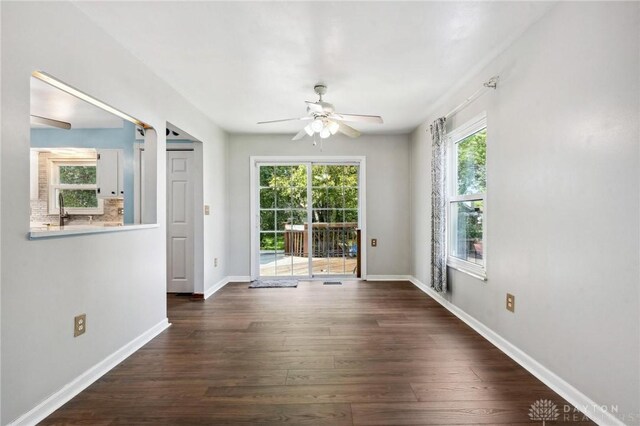 4278 Crownwood Ave, Dayton, OH 45415 - unfurnished room featuring ceiling fan and dark wood-style floors
