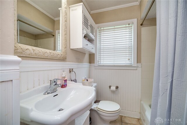 2231 King Ave, Dayton, OH 45420 - full bathroom featuring crown molding, shower / bath combo, wainscoting, and tile patterned flooring