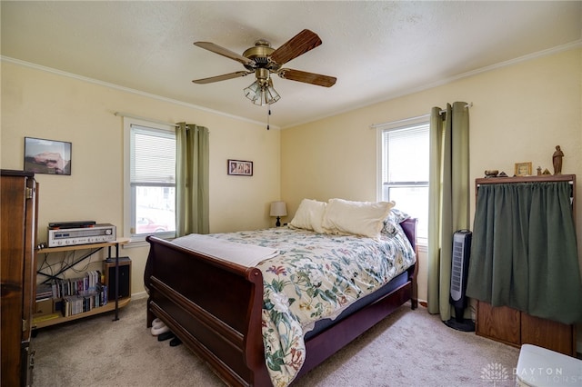 2231 King Ave, Dayton, OH 45420 - bedroom featuring multiple windows, carpet, ornamental molding, and ceiling fan