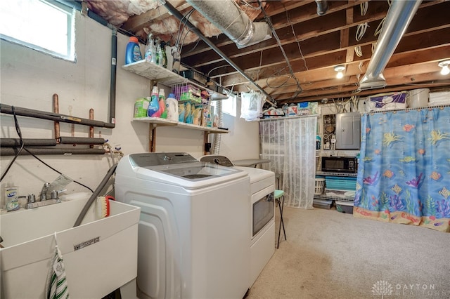 2231 King Ave, Dayton, OH 45420 - laundry area featuring washing machine and clothes dryer, electric panel, and plenty of natural light