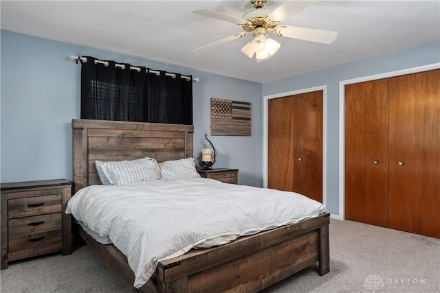 2378 E Rahn Rd, Kettering, OH 45440 - carpeted bedroom featuring two closets and ceiling fan