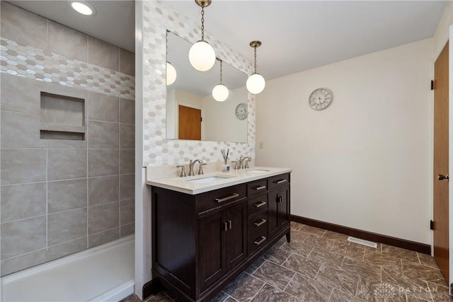 2378 E Rahn Rd, Kettering, OH 45440 - full bath with double vanity, backsplash, and tiled shower