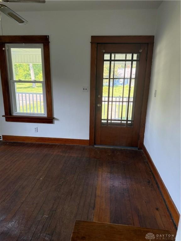 114 N Clayton Rd, New Lebanon, OH 45345 - empty room featuring hardwood / wood-style floors, healthy amount of natural light, and a ceiling fan
