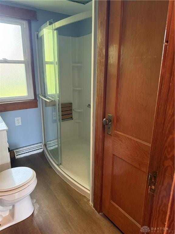 114 N Clayton Rd, New Lebanon, OH 45345 - full bath with a stall shower, wood finished floors, and vanity