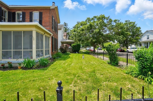 40 E Main St, West Carrollton, OH 45449 - view of yard featuring a sunroom