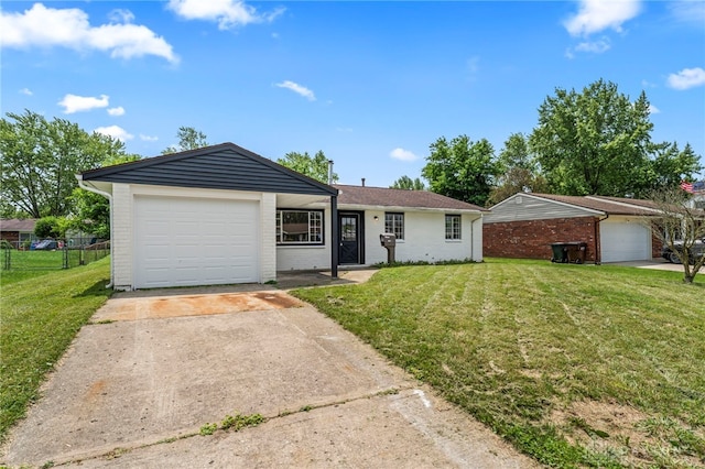 1927 Vermont Dr, Xenia, OH 45385 - ranch-style house featuring driveway, a garage, and brick siding
