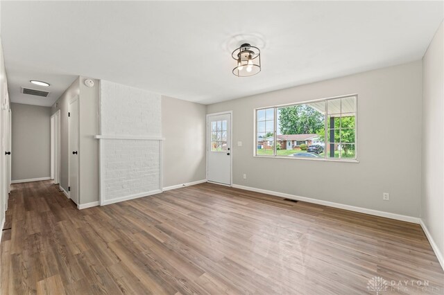 1927 Vermont Dr, Xenia, OH 45385 - spare room with wood finished floors and a smoke detector