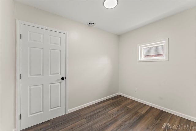 1927 Vermont Dr, Xenia, OH 45385 - unfurnished room featuring dark wood finished floors and baseboards