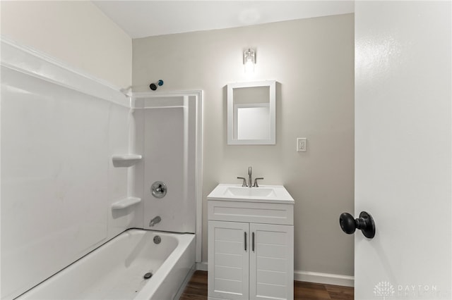 1927 Vermont Dr, Xenia, OH 45385 - bathroom with vanity, bathtub / shower combination, and wood finished floors