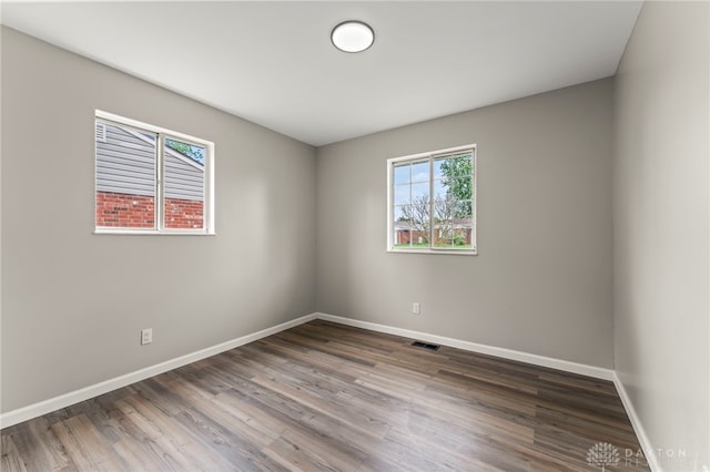 1927 Vermont Dr, Xenia, OH 45385 - empty room featuring wood finished floors and baseboards