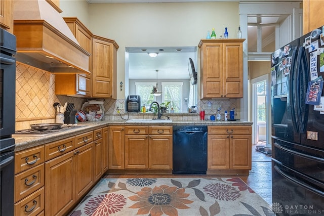 3149 W State Route 73, Wilmington, OH 45177 - kitchen featuring black appliances, custom range hood, and light countertops