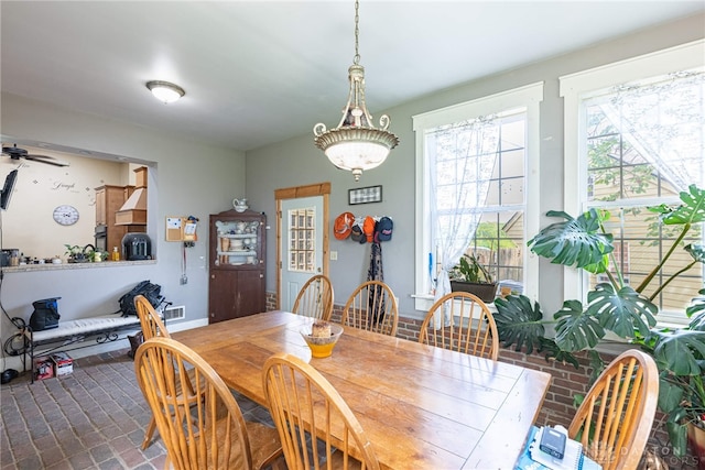 3149 W State Route 73, Wilmington, OH 45177 - dining space with ceiling fan and brick patterned flooring
