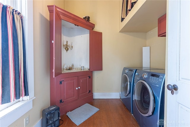3149 W State Route 73, Wilmington, OH 45177 - washroom featuring washing machine and dryer and dark wood finished floors