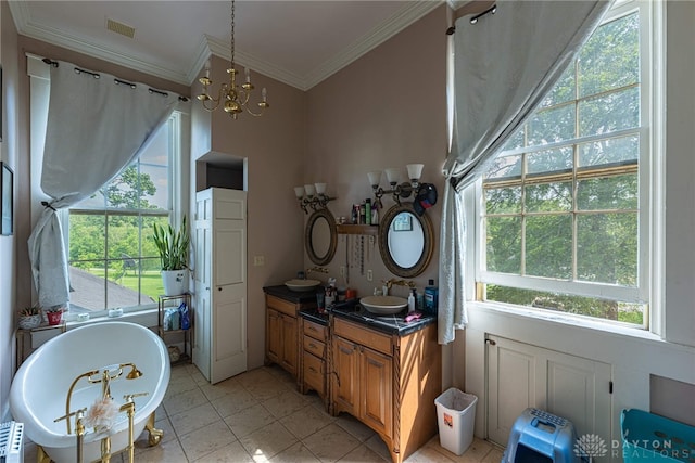 3149 W State Route 73, Wilmington, OH 45177 - bathroom with vanity, a chandelier, a soaking tub, ornamental molding, and tile patterned floors