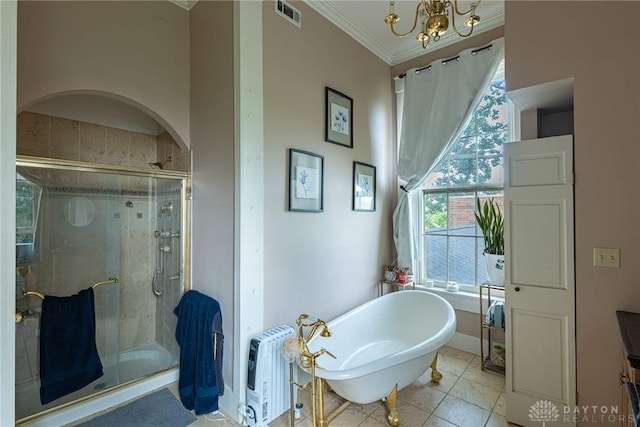 3149 W State Route 73, Wilmington, OH 45177 - bathroom featuring a freestanding bath, healthy amount of natural light, a shower stall, crown molding, and a chandelier