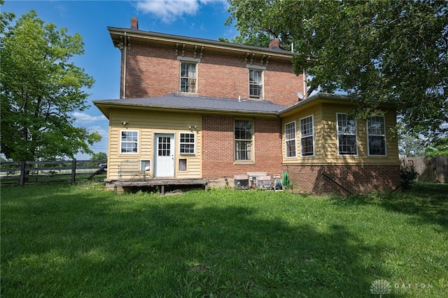 3149 W State Route 73, Wilmington, OH 45177 - back of house featuring a chimney and brick siding