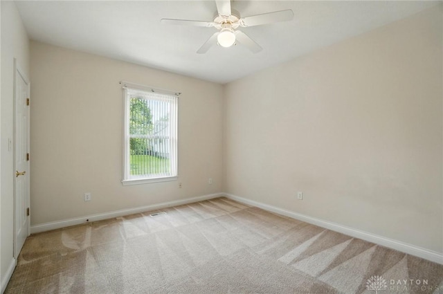 3862 Robinson Vail Rd, Franklin, OH 45005 - carpeted spare room featuring baseboards and a ceiling fan