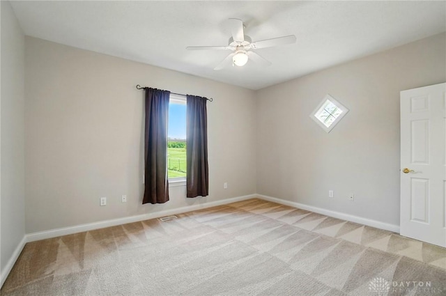 3862 Robinson Vail Rd, Franklin, OH 45005 - spare room featuring light colored carpet and ceiling fan