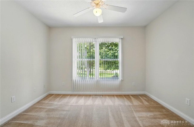 3862 Robinson Vail Rd, Franklin, OH 45005 - spare room with carpet floors and ceiling fan