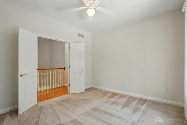 3862 Robinson Vail Rd, Franklin, OH 45005 - empty room with light carpet and ceiling fan