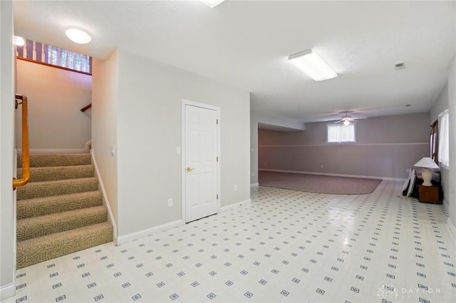 3862 Robinson Vail Rd, Franklin, OH 45005 - basement with stairs, light colored carpet, and ceiling fan