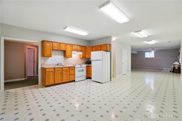 3862 Robinson Vail Rd, Franklin, OH 45005 - kitchen with white appliances, under cabinet range hood, light countertops, a ceiling fan, and brown cabinets