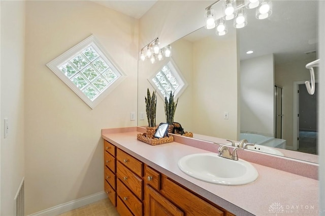 3862 Robinson Vail Rd, Franklin, OH 45005 - full bathroom with vanity and baseboards