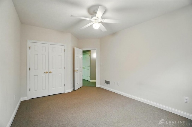 3862 Robinson Vail Rd, Franklin, OH 45005 - unfurnished bedroom featuring carpet, a closet, and a ceiling fan