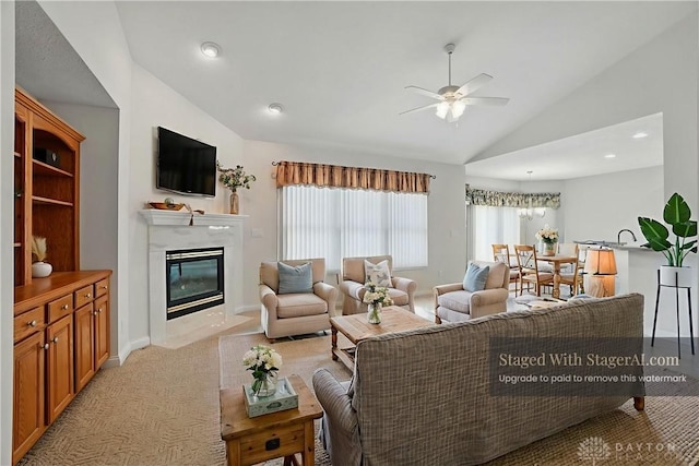 3862 Robinson Vail Rd, Franklin, OH 45005 - living area with vaulted ceiling, ceiling fan, a premium fireplace, light carpet, and recessed lighting
